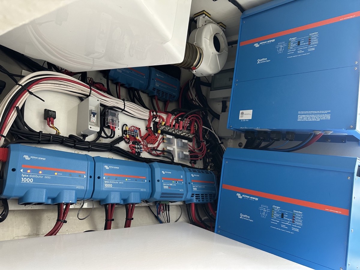 Large yacht 600Ah 48V Victron Lithium NG electrical system with two 10000-watt Quattro inverter chargers delivering 20000 watts total